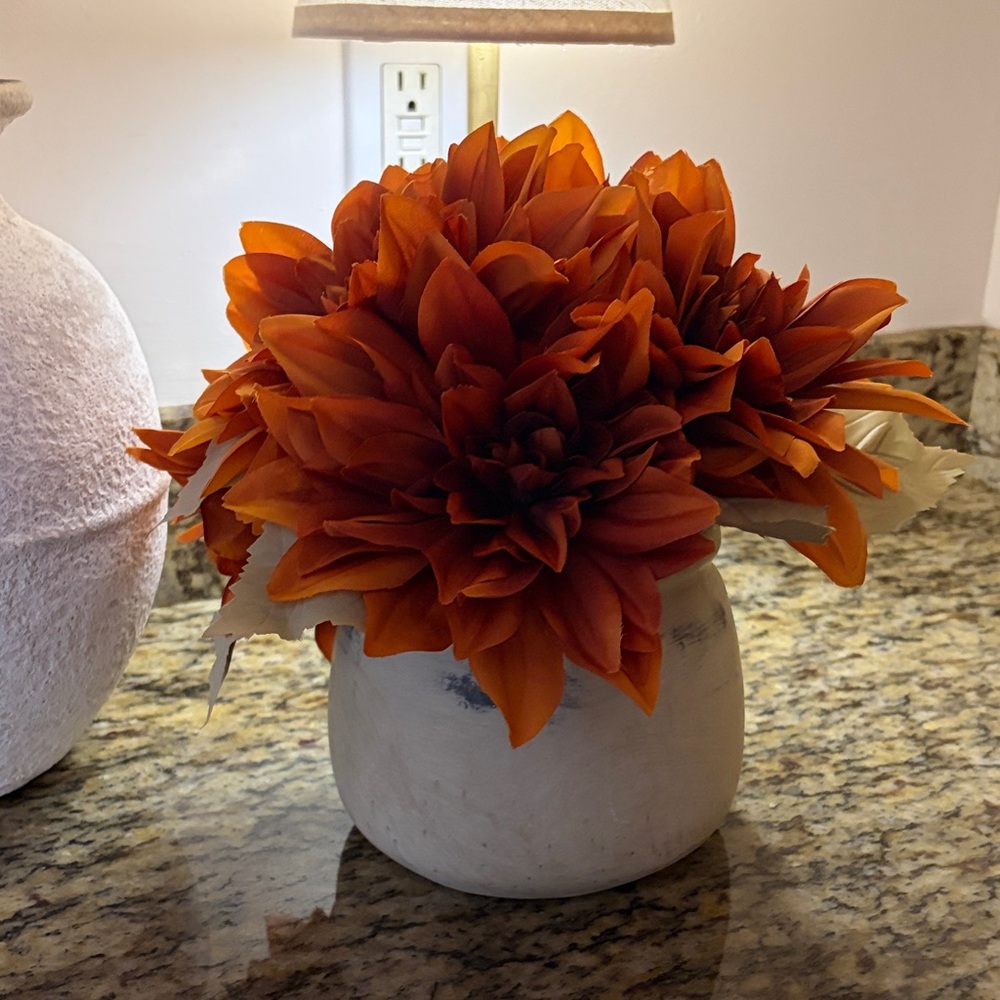 Orange Floral Arrangement in White Vase